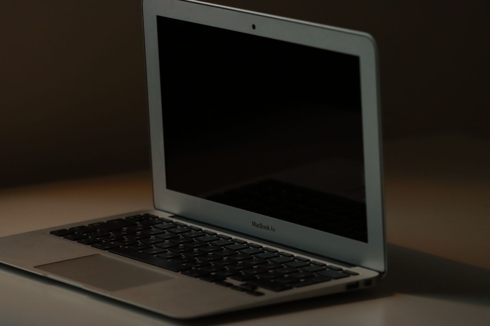 Close-up of a thin silver MacBook Air laptop