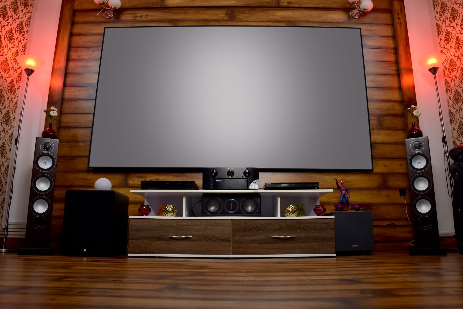 Home theater projection screen with a projector casting a bright picture