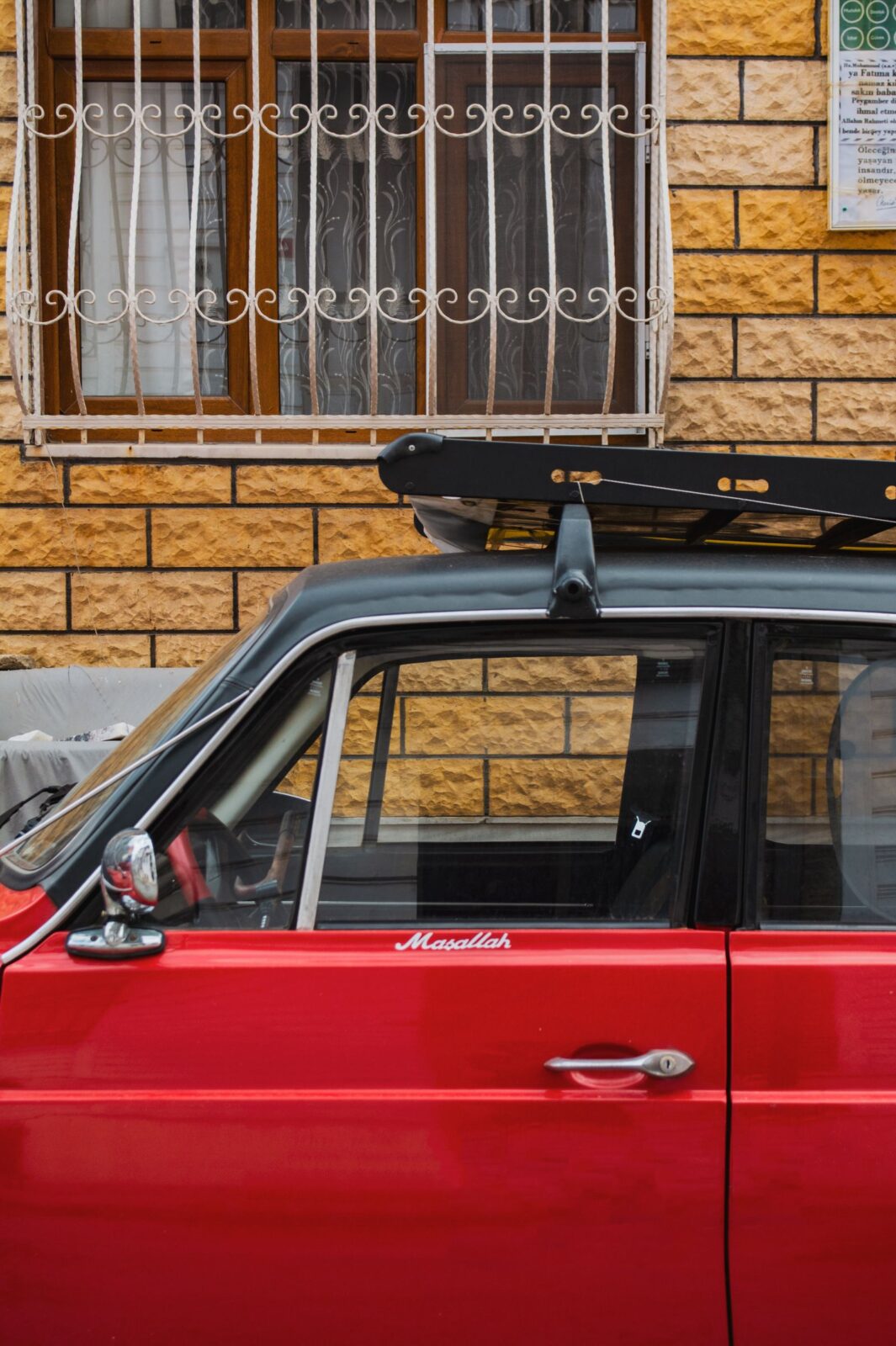 A car fitted with a roof rack ready for a rooftop cargo box