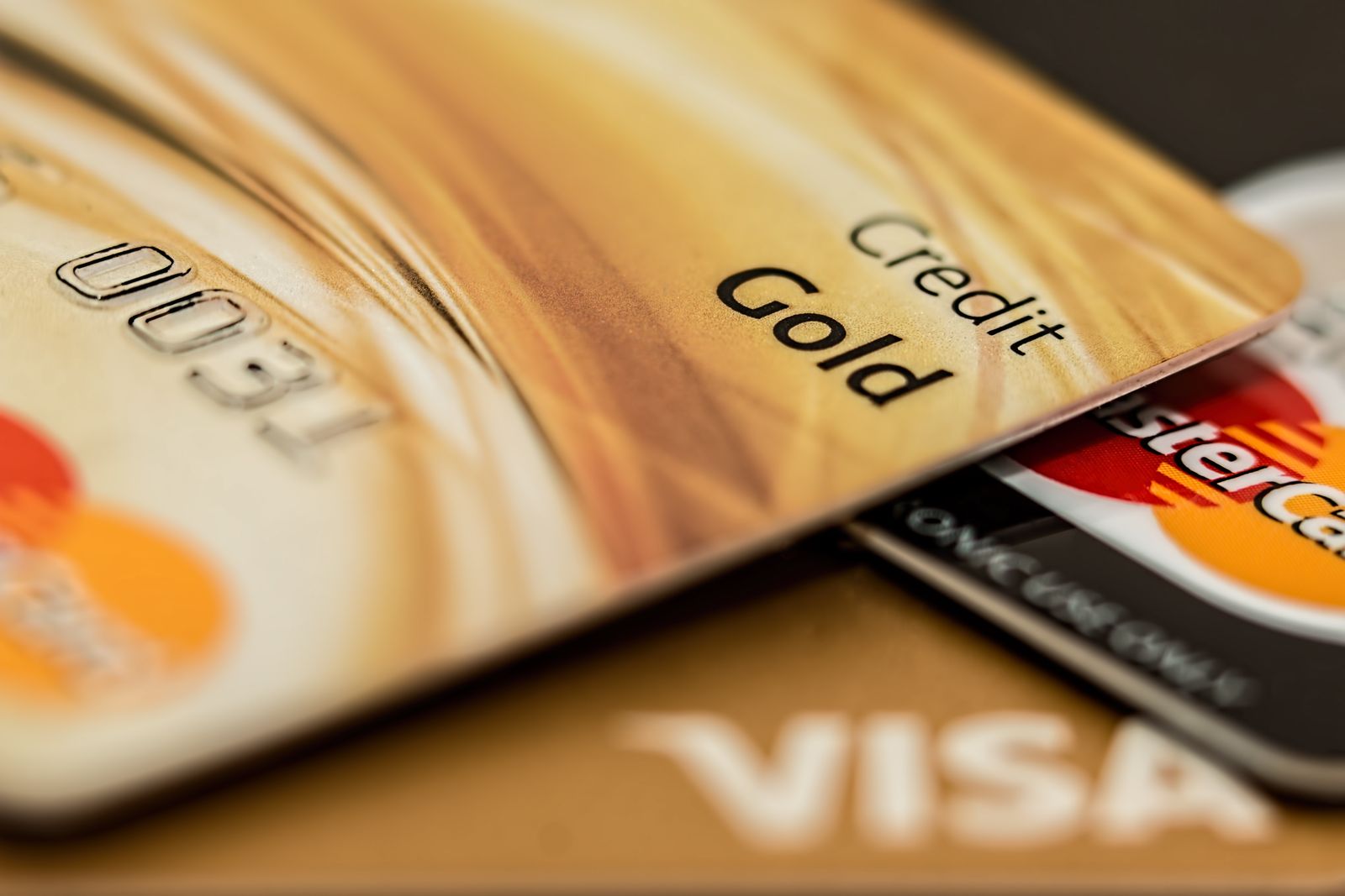 A close-up of several payment cards fanned out