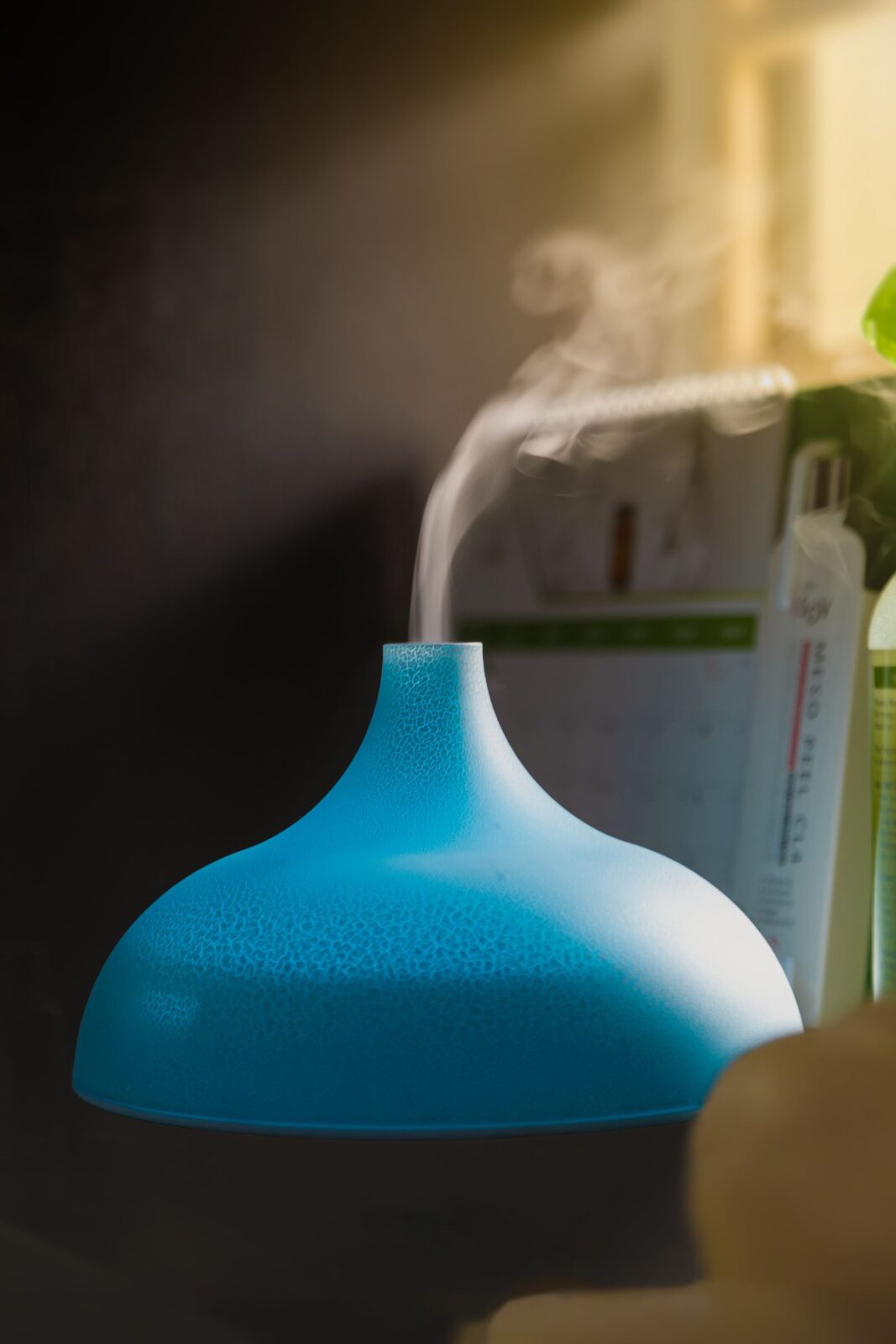 Close-up of an ultrasonic diffuser releasing a soft plume of scented mist