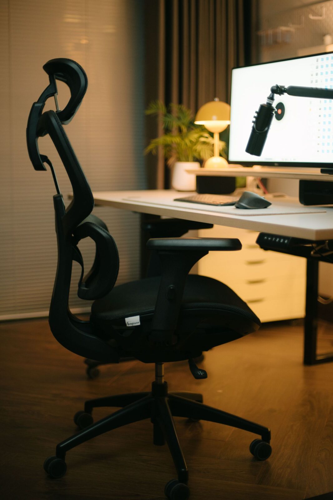 A modern home office desktop setup with monitor
