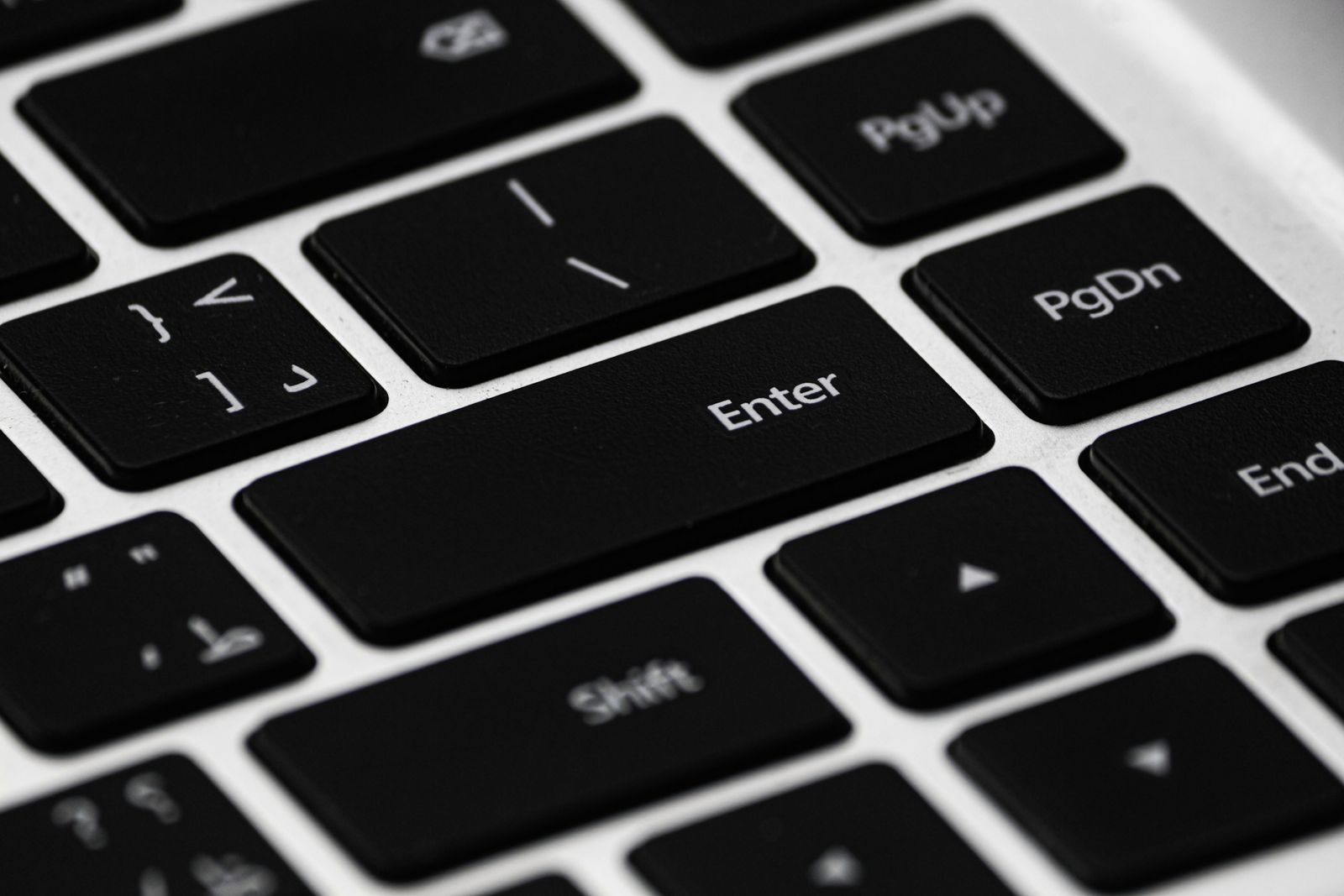 Close-up of a modern laptop keyboard showing key layout