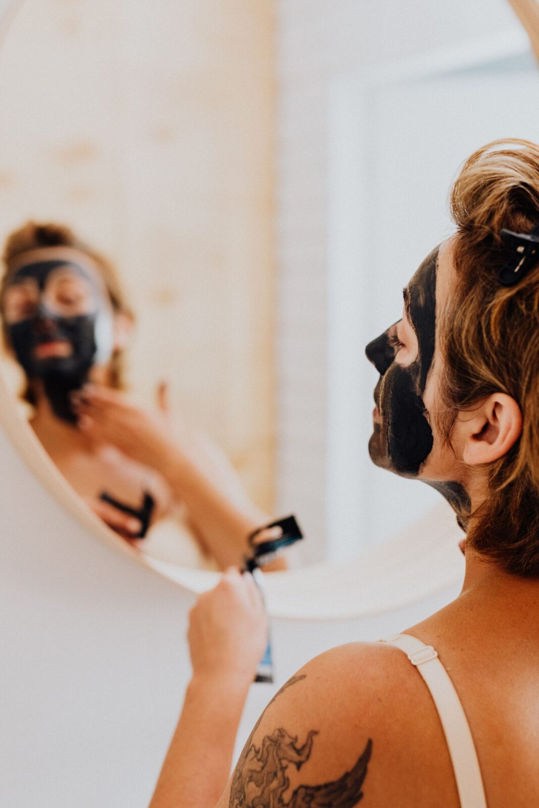 A woman going through her at-home skincare routine
