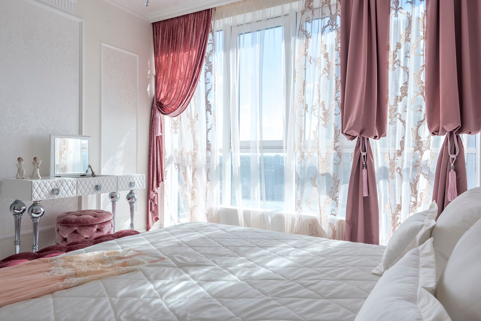 Cozy bedroom with a soft plush rug extending from under the bed