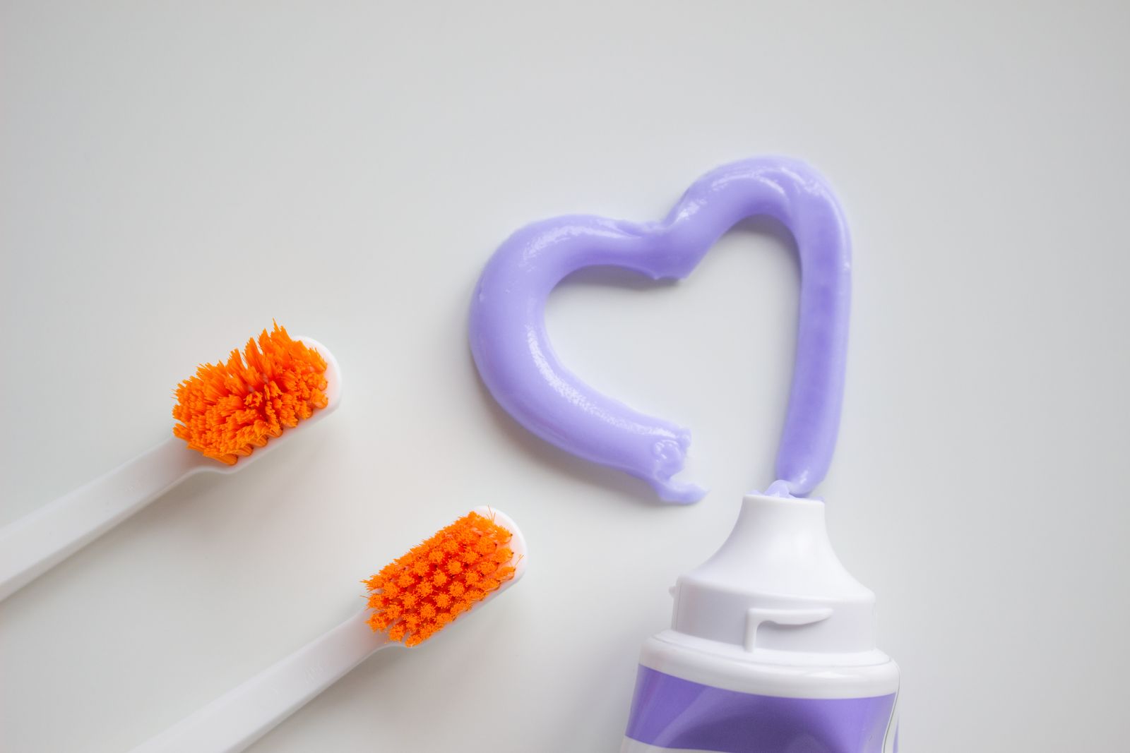 An electric toothbrush with charging base and spare brush heads