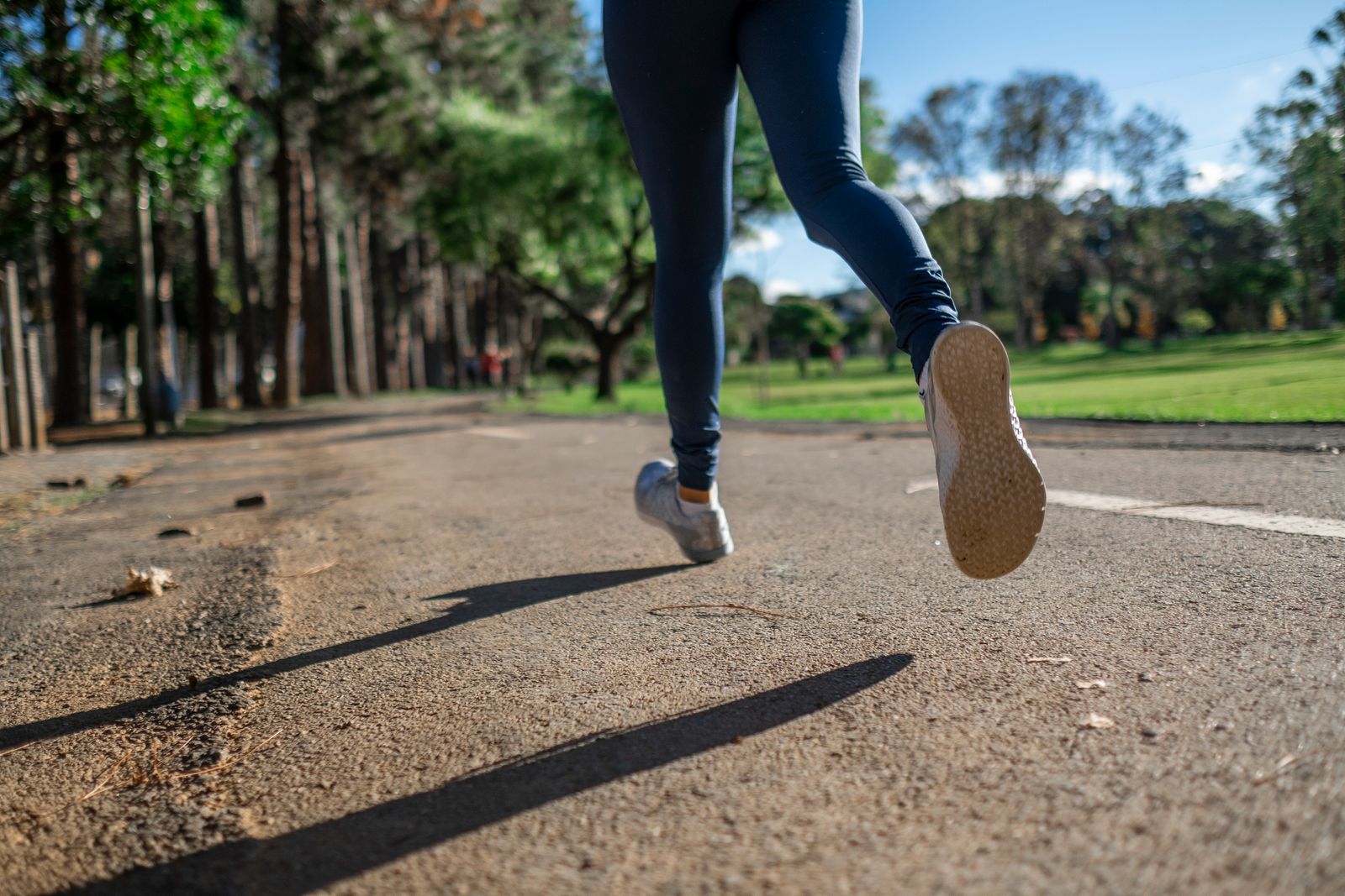 A person jogging outdoors, representing everyday activity tracking