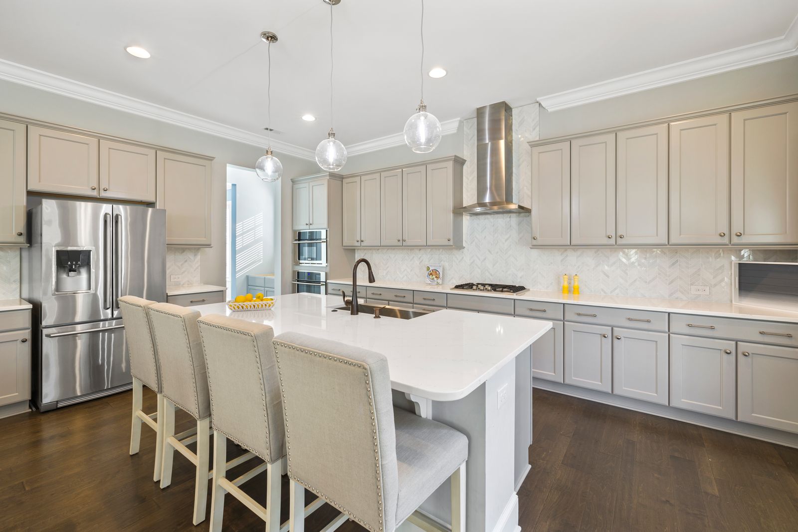 White kitchen cabinets over a counter, a typical spot for under-cabinet light bars or strips